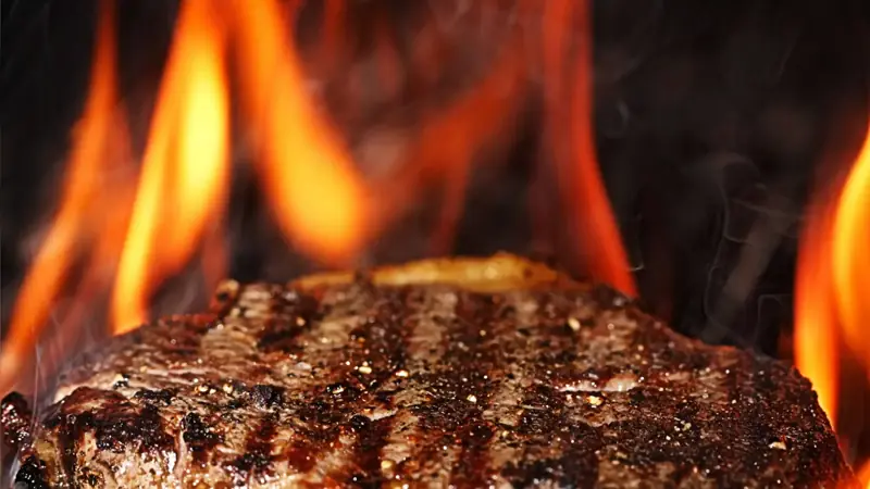 Steak on the charcoal grill at JUZE